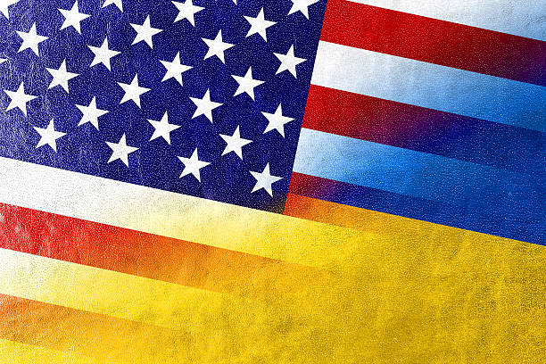 istock Ukraine and USA Flag painted on leather texture 526670309
