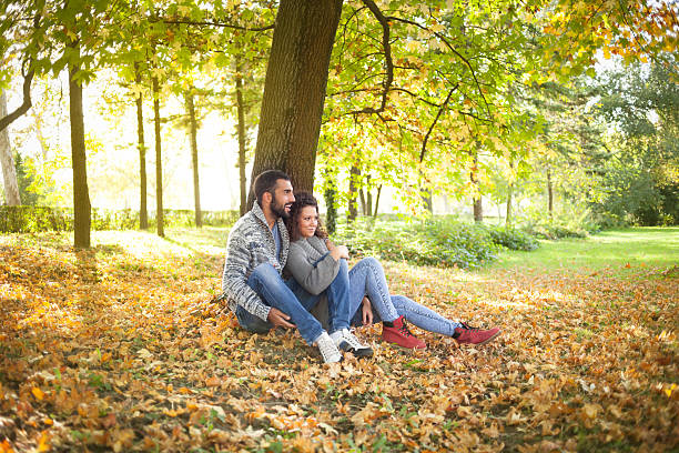 istock happy young couple in park 526670339