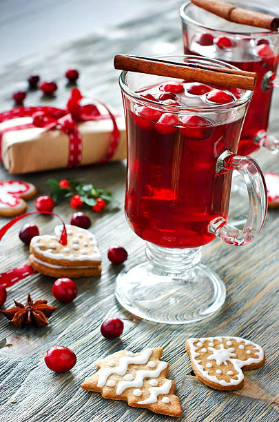 istock Mulled wine with cranberry, cookies and christmas decorations 526670381