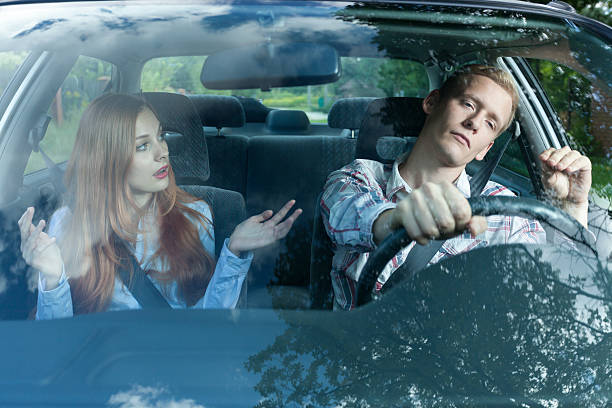 istock Young couple arguing in car 526683645