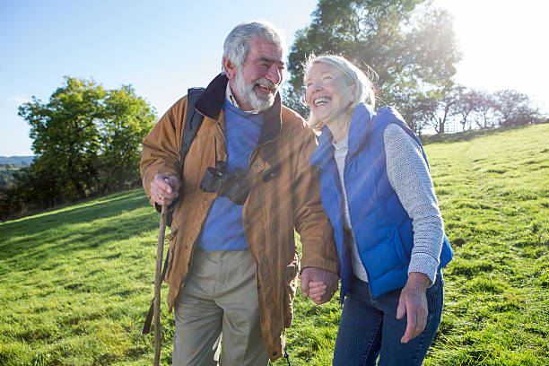 istock Mature Couple Walking in the Countryside 526683859