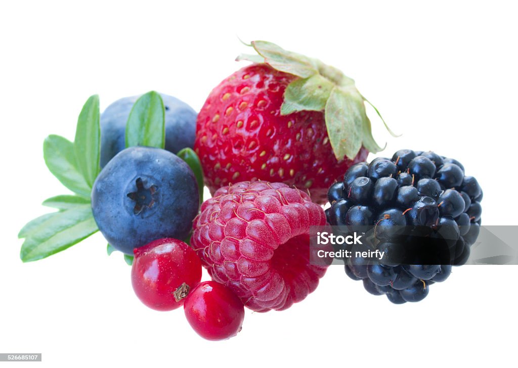 fresh berries  on white background Pile of fresh berries isolated on white background Berry Fruit Stock Photo