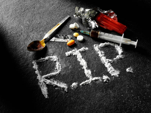 istock R.I.P. with Drugs on a Dark Slate Background 526685657