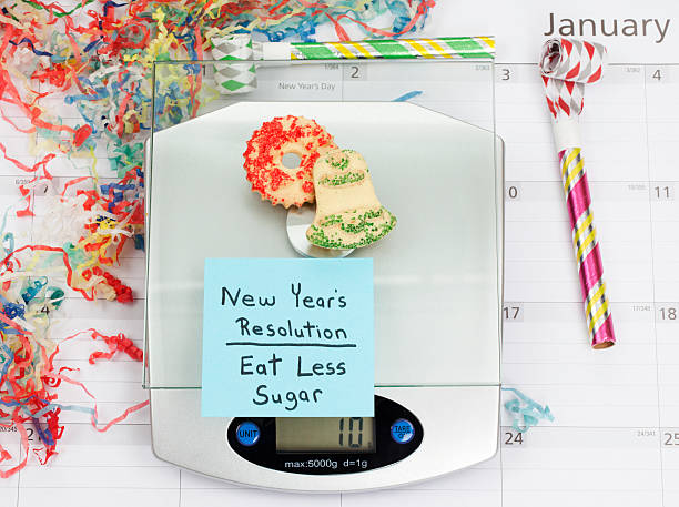 risoluzione nuovo anno: mangiare meno zucchero - dieting planning calendar event foto e immagini stock