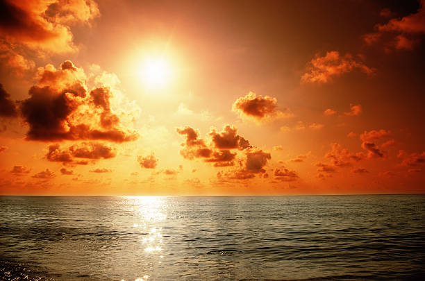 Lever du soleil à la mer - Photo