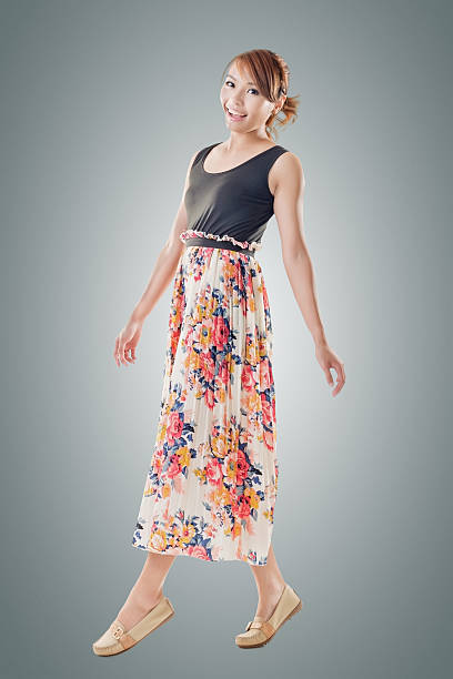 istock Attractive Asian woman with maxi dresses 526702033