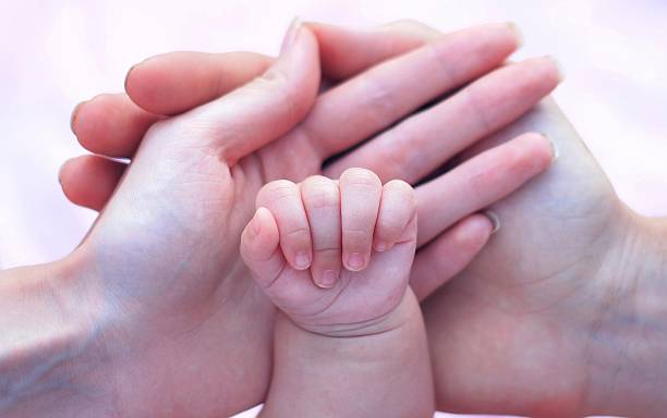 istock Touch of newborn 526702905