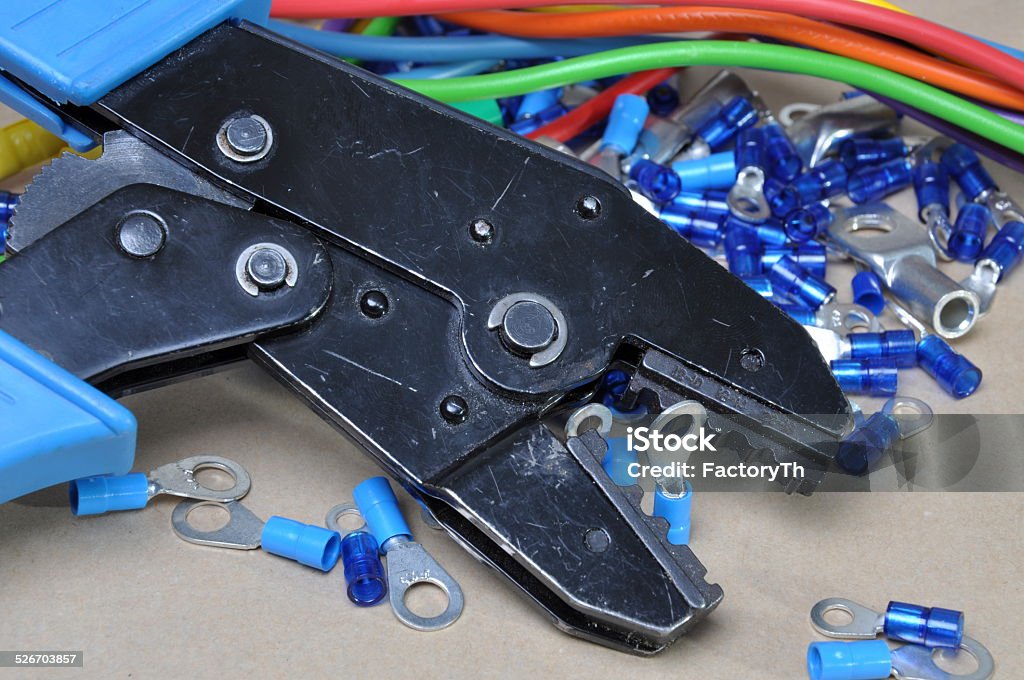 Crimping tool Crimping tool and cable terminals Power Line Stock Photo