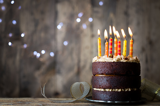 Chocolate birthday cake with candles