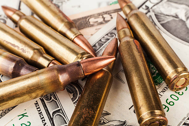 istock American Bullets on Dollars 526704922
