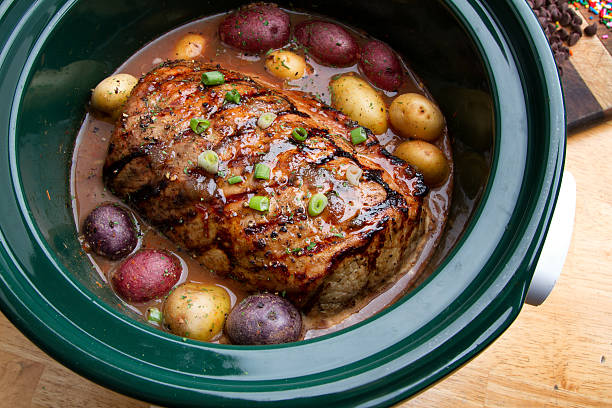 istock Delicious Pot Roast Dinner in a Crock Pot 526705267