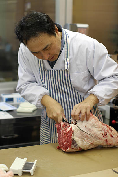 Proprietor in a Japanese meat store