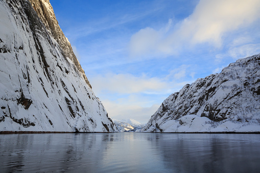 View of Trollfjord with snow-capped mountains on Lofoten Islands, Nordland, Norway