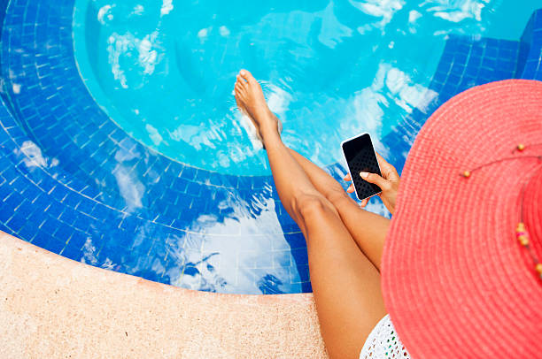 istock Overview of a woman using smart phone. 526705624
