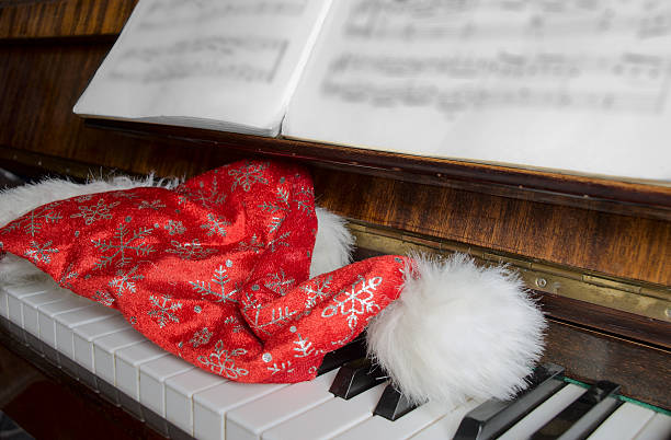 istock Santa Claus's cap lies on a piano 526706835