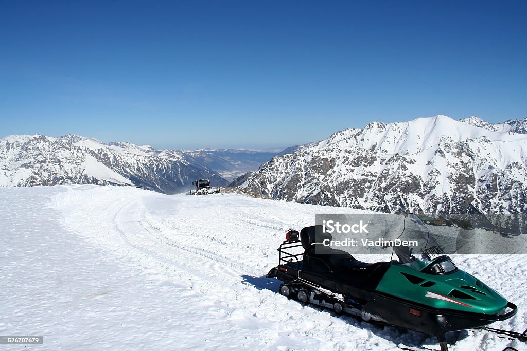 Snowmobile with an inscription "Hire" In the mountains of Dombai, Caucasus Rescue Stock Photo