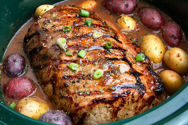 istock Delicious Pot Roast Dinner in a Crock Pot 526708289