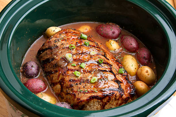 istock Delicious Pot Roast Dinner in a Crock Pot 526708297