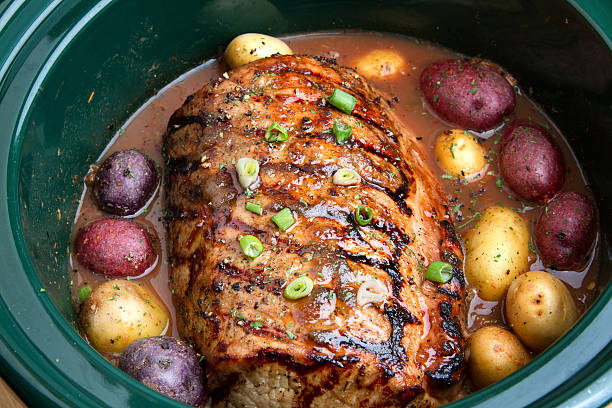 istock Delicious Pot Roast Dinner in a Crock Pot 526708299