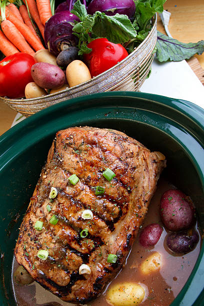 istock Delicious Pot Roast Dinner in a Crock Pot 526708323