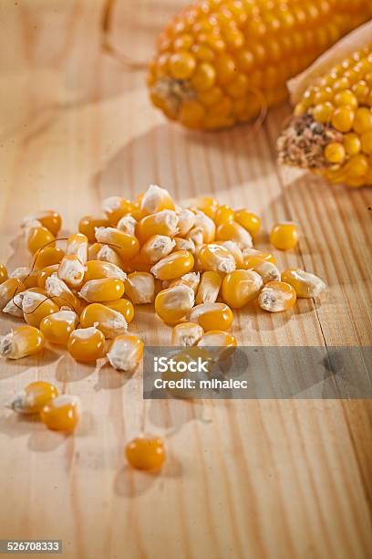 Corn And Ear Of Corns On Wooden Table Stock Photo - Download Image Now - Brown, Cereal Plant, Close-up