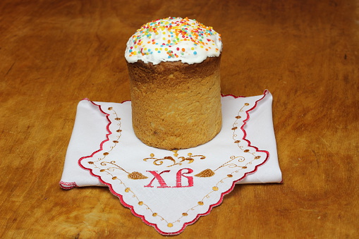 Russian Easter cake and towel on a board.