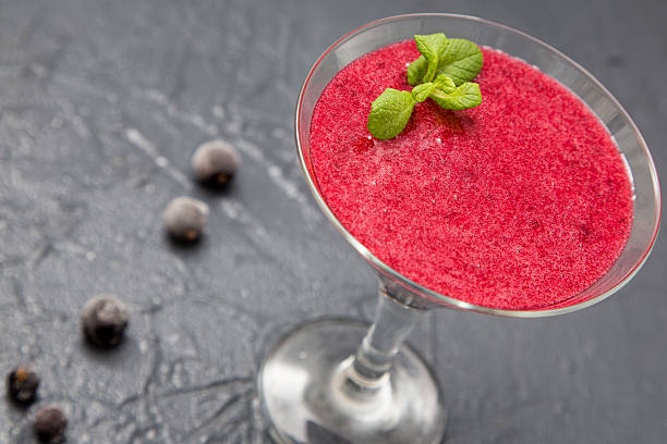 istock red smoothie with frozen berries, selective focus, top view. the 526711790