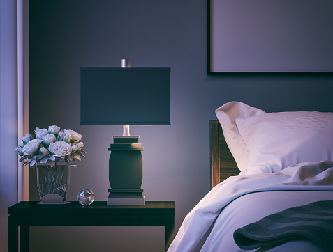 A close-up shot of modern bedroom at night. Render image.