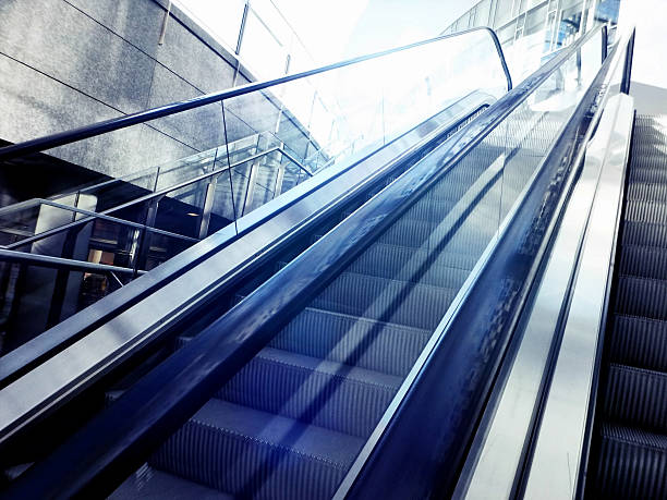 istock modern escalator in public square in Milan modern district 526715546