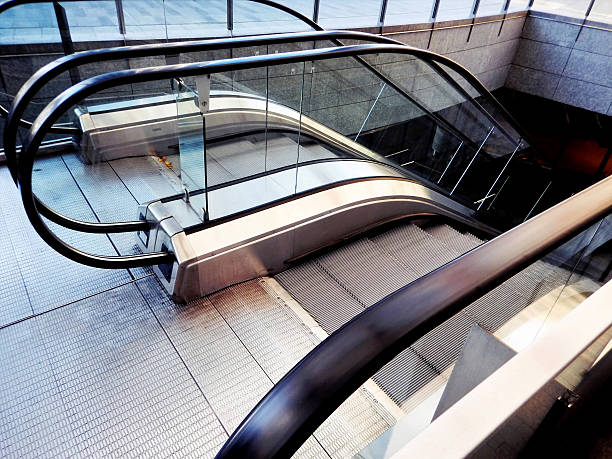 istock modern escalator in public square in Milan modern district 526716434