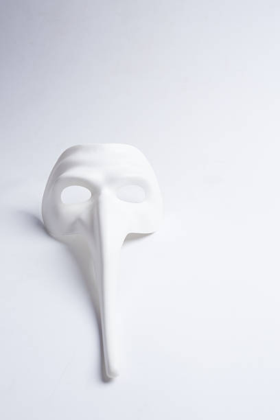 istock white venetian mask on a white background 526716570