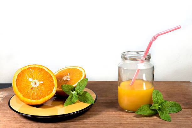 istock Orange and orange juice 526721056