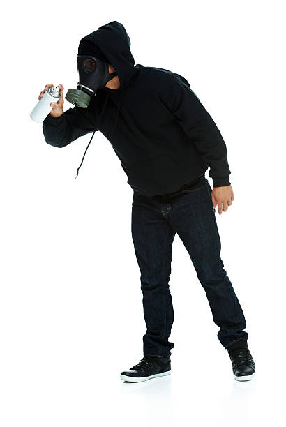 istock Graffiti artist in action with aerosol can 526721827