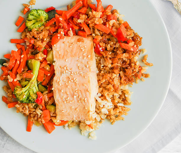istock Grilled salmon with quinoa and vegetables 526722426