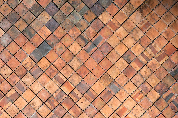 Terracotta tiles wall for abstract Texture background stock photo