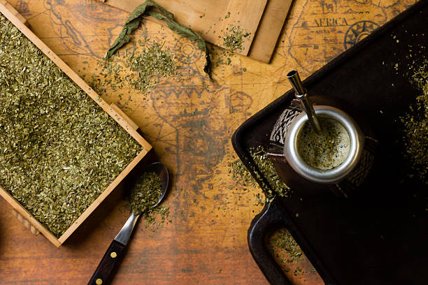 istock Yerba mate, antique map. Dry herb. Top View. Vintage background 526722864