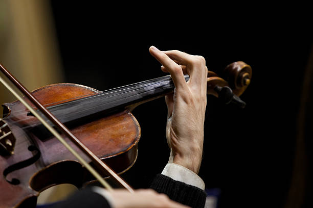 istock Hands musician playing the violin 526723154