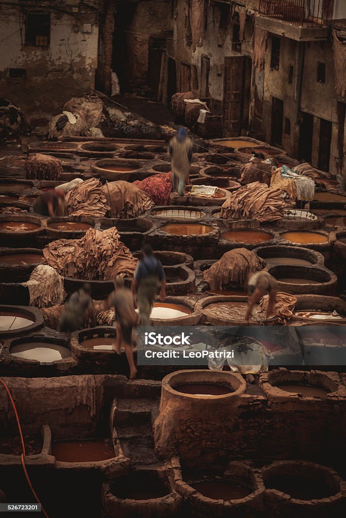 Famous dyeing tannery in Fez, Morocco Aerial Fez medina cityscape over the famous leather tanneries. Fez - Morocco Stock Photo