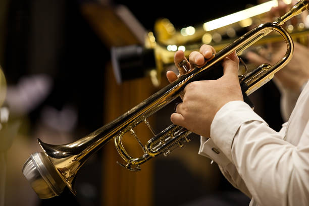 istock Hands of man playing the trumpet 526723440