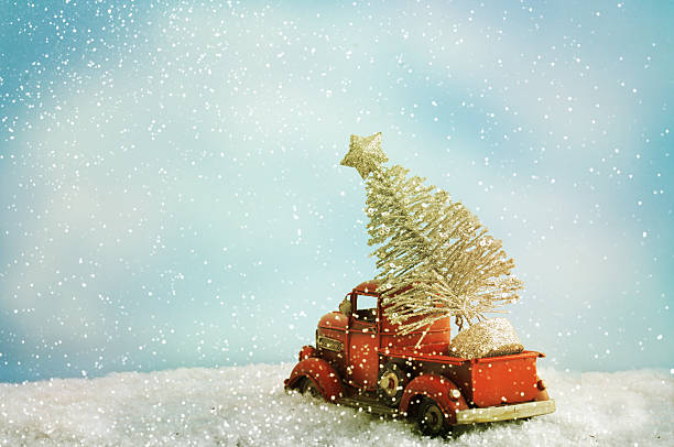 istock toy car with Christmas tree 526723966