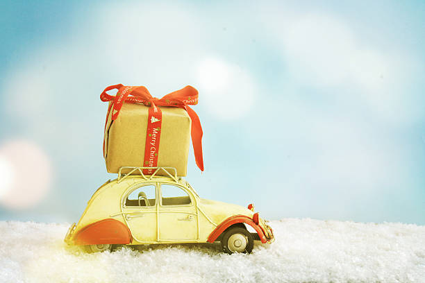 istock toy car with Christmas gift 526724192