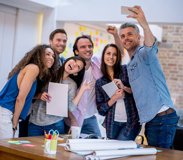 istock Business people taking a selfie 526724203