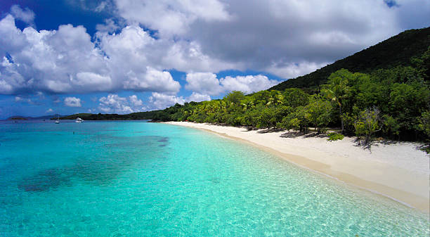 pristine beach at Honeymoon Bay, St.John, US Virgin Islands Honeymoon Bay, St.John, US Virgin Islands - beautiful beach on North Shore of a little Caribbean island honeymoon bay stock pictures, royalty-free photos & images