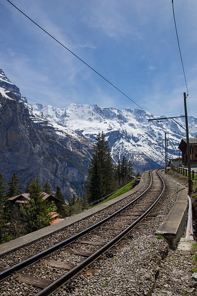 istock Train line running through the Swiss Alps 526724576