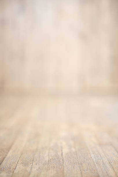 istock Blurred image of wooden background 526724586
