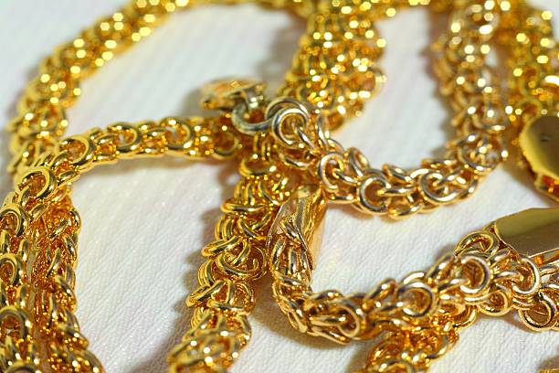 istock gold chain around his neck. 526724878