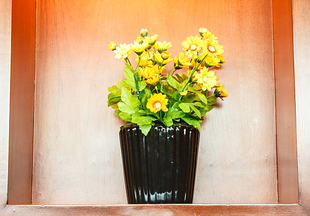 Vase of beautiful flowers Placed in a container used for decoration