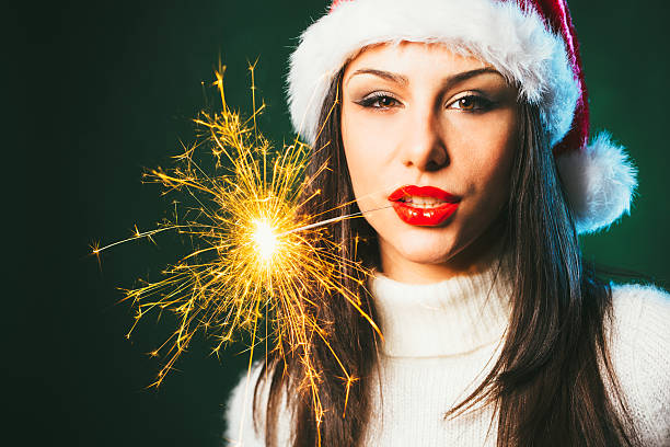 istock Beautiful female with sparkler 526725773