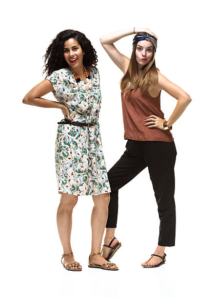 istock Two women standing together & looking at camera 526725983