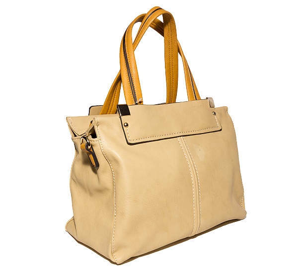 istock female handbag on a white background 526725998